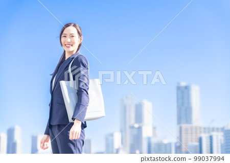 Career woman working towards a bright future 99037994