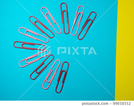 Paper work. Colored paper clips. Work with documents. Office. 99038552