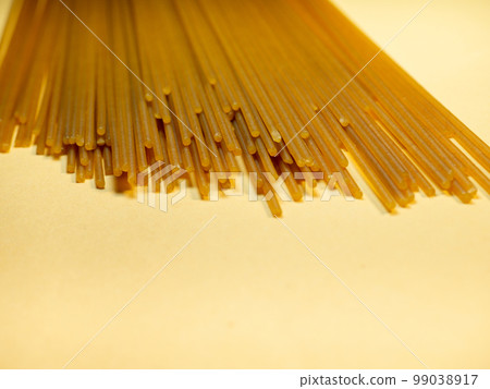 Spaghetti of two types on the table. buckwheat pasta. Italian food. Long pasta. Cooking food. 99038917