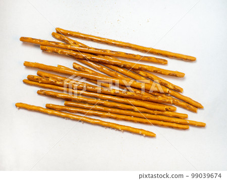 Salted sticks. Confectionery on the table. Salty baked goods. 99039674