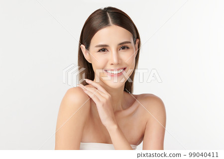 Beautiful young asian woman with clean fresh skin on white background, Face care, Facial treatment, Cosmetology, beauty and spa, Asian women portrait. Beautiful young asian woman with clean fresh skin on white background, Face care, Facial treatment, Cosmetology, beauty and spa, Asian women portrait. 99040411