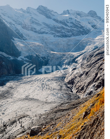 Mountains with snow and glacier. Peak of mountain and ice glacier 99040943