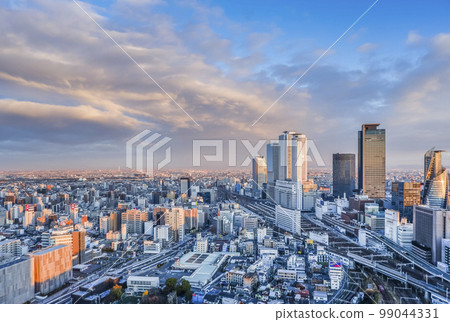 Overlooking the skyscrapers in the Meieki area at sunrise and the northwest city area 99044331