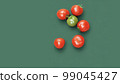 tomatoes with green background 99045427