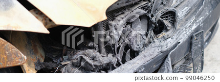 Burnt out car and wiring faults closeup Burnt out car and wiring faults closeup 99046250