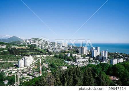View of the sea and the houses of the city of Sochi. 99047314