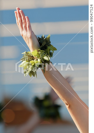 Hands of a woman doing a hula dance Hands of a woman doing a hula dance 99047524