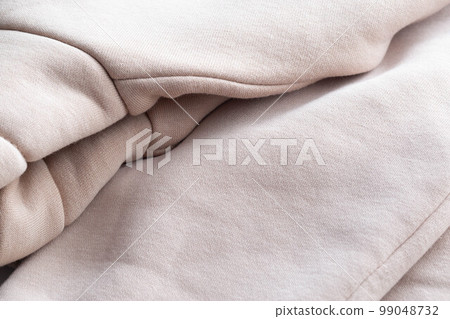 Warm gray sweatshirt, macro. Decorative Warm gray sweatshirt, macro. Decorative 99048732