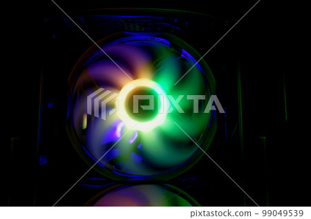 Computer cooler with RGB LED light. Computer circuit board and CPU cooling fans illuminated Computer cooler with RGB LED light. Computer circuit board and CPU cooling fans illuminated 99049539