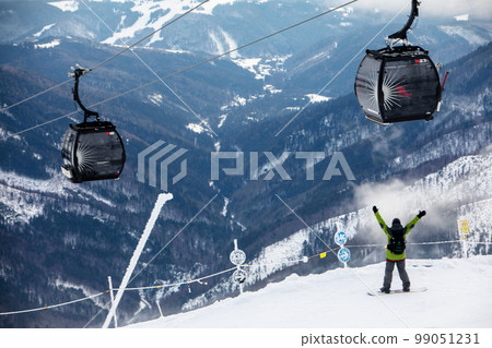 snowboarder at the slope of chopok mountain in slovakia snowboarder at the slope of chopok mountain in slovakia 99051231