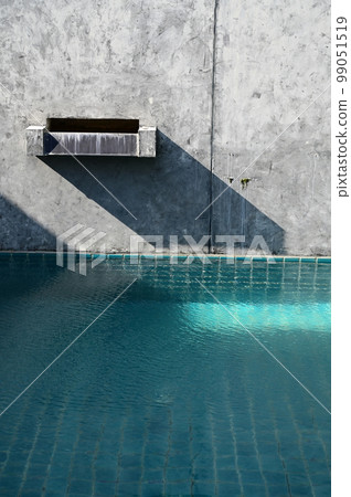 faucet of swimming pool on cement wall, construction industry faucet of swimming pool on cement wall, construction industry 99051519