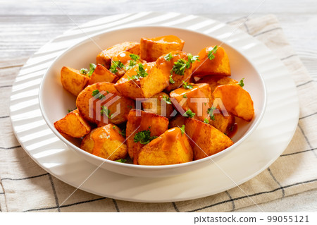 patatas bravas, deep fried potatoes with sauce patatas bravas, deep fried potatoes with sauce 99055121