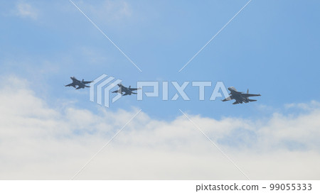 Air Self-Defense Force F-2 and Sukhoi Su-30 above the clouds 99055333