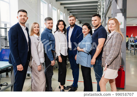 a group of men and women in coworking. the concept of teamwork. 99058707