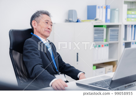 A man in a managerial position who speaks his opinion in the company A man in a managerial position who speaks his opinion in the company 99058955