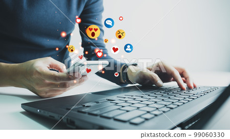 Concept of using digital media, technology, social media online surfing, woman's hand using smartphone to use the internet, work from home for social distancing. 99060330