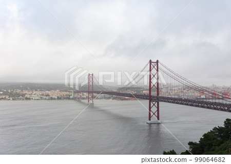 The 25 April bridge in cloudy weather The 25 April bridge in cloudy weather 99064682