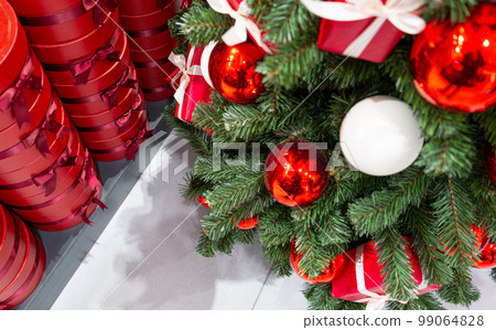 Decorated Christmas Tree, Christmas Decorations, Shiny Garland on Green Branches, Blurred Background 99064828