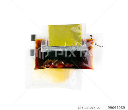 Sushi Sauces Set Isolated with Wasabi Sauce, Pickled Ginger, Soy Souse Teriyaki in Square Plastic Bags 99065089