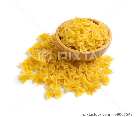 Raw Farfalle Pasta Isolated, Yellow Dry Noodles, Wheat Bow Macaroni, Uncooked Farfalle in Wood Bowl 99065542