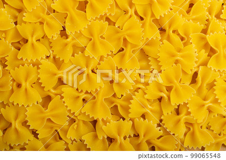 Raw Farfalle Pasta Texture Background, Yellow Dry Butterfly Noodles Pattern, Wheat Bow Macaroni Mockup 99065548