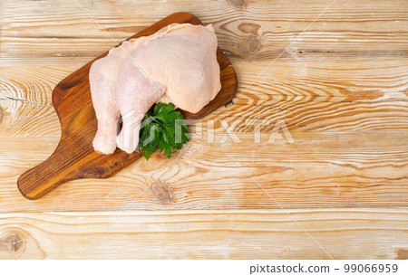 Raw Chicken Legs on Wood Board, Uncooked Poultry Drumsticks Mockup, Fresh Chicken Quarter 99066959