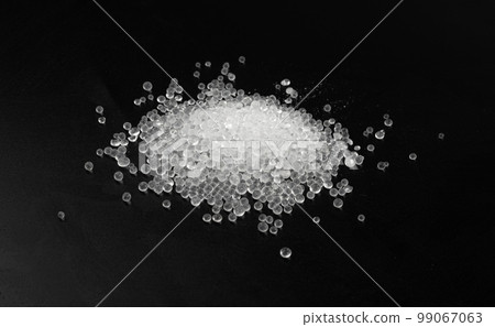 Desiccant Silica Gel Adsorbent Crystals on Black Background, Desiccant Polymer Balls 99067063