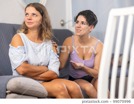 LGBT lesbian couple having problems in relationship 99070996