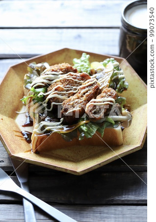 Minced meat cutlet and vegetable open sandwich with coffee and bread topping Minced meat cutlet and vegetable open sandwich with coffee and bread topping 99073540