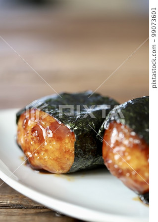 Sweet and spicy potato dumplings wrapped in seaweed Sweet and spicy potato dumplings wrapped in seaweed 99073601