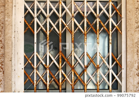 Metal structures made of old and rusty iron. 99075792