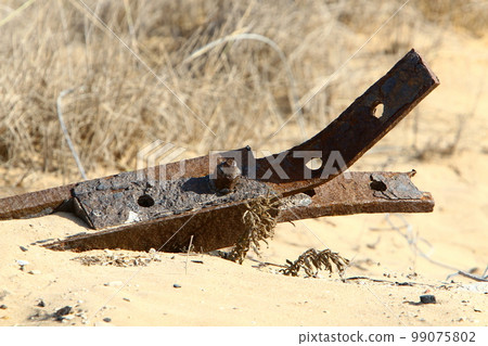 Metal structures made of old and rusty iron. Metal structures made of old and rusty iron. 99075802