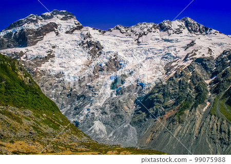 Hooker Valley meadows and Mt Cook massif, South Island of New Zealand 99075988