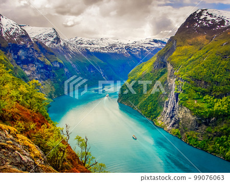 Above idyllic Geiranger fjord dramatic landscape, Norway Above idyllic Geiranger fjord dramatic landscape, Norway 99076063