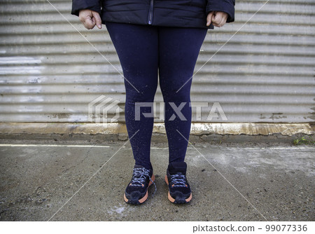 Woman's feet with mud Woman's feet with mud 99077336