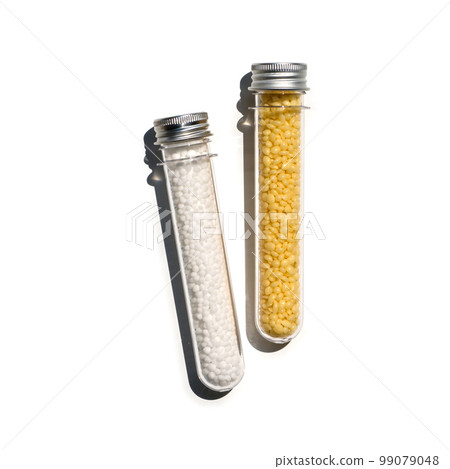 Carbamide and Candelilla Wax in PET preform bottle with aluminium cap. Cosmetic chemicals ingredient on laboratory table. Carbamide and Candelilla Wax in PET preform bottle with aluminium cap. Cosmetic chemicals ingredient on laboratory table. 99079048