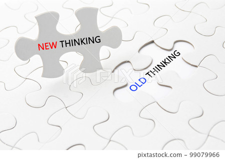 Image of replacing old ideas with new ideas in a jigsaw puzzle 99079966