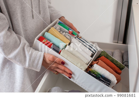 Vertical clothing storage ideas.  99081681