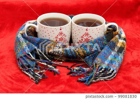 Winter concept with tea for two and a scarf 99081830
