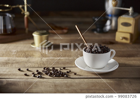Coffee brewed from freshly roasted beans Coffee brewed from freshly roasted beans 99083726