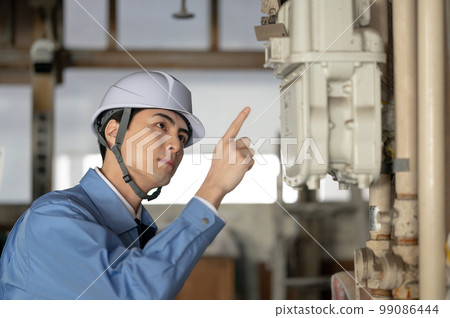 Male in work clothes Inspection Inspection 99086444