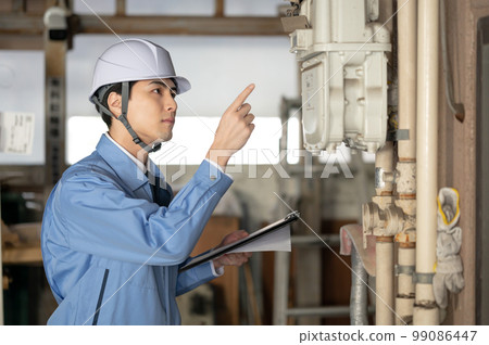 Male in work clothes Inspection Inspection 99086447