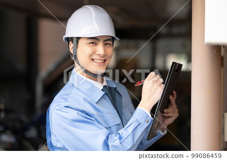 Male in work clothes Inspection Inspection 99086459