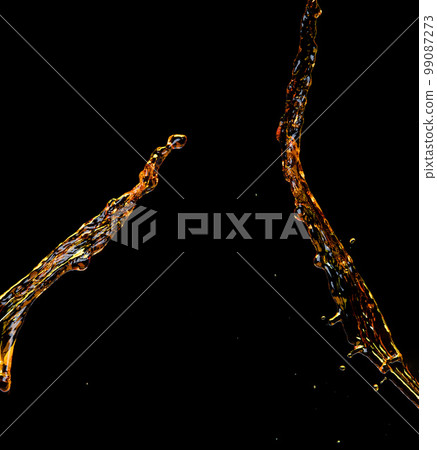 Orange, lemon juice or oil lubricant splash, liquid gold yellow drink drops. Fruit beverage water elements in line form . Fresh splashing and flowing jets, black background isolated freeze motion Orange, lemon juice or oil lubricant splash, liquid gold yellow drink drops. Fruit beverage water elements in line form . Fresh splashing and flowing jets, black background isolated freeze motion 99087273