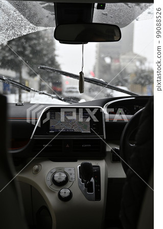 Inside the car on a snowy day Inside the car on a snowy day 99088526