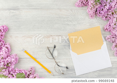 Notebook with pen and lilac. 99089148