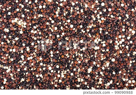 Quinoa seeds background. Mix of white, red and black quinoa. Top view. Quinoa seeds background. Mix of white, red and black quinoa. Top view. 99090988