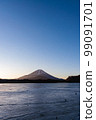 Mount Fuji at sunrise seen from frozen Lake Shoji 99091701