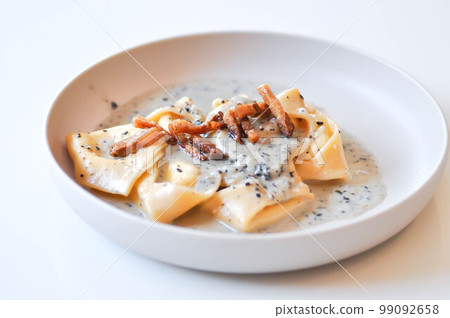 pasta or tortellini with guanciale , pasta carbonara pasta or tortellini with guanciale , pasta carbonara 99092658