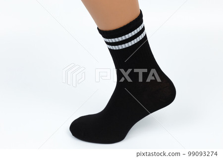 Socks on a white background. Socks on the leg. Socks on a white background. Socks on the leg. 99093274